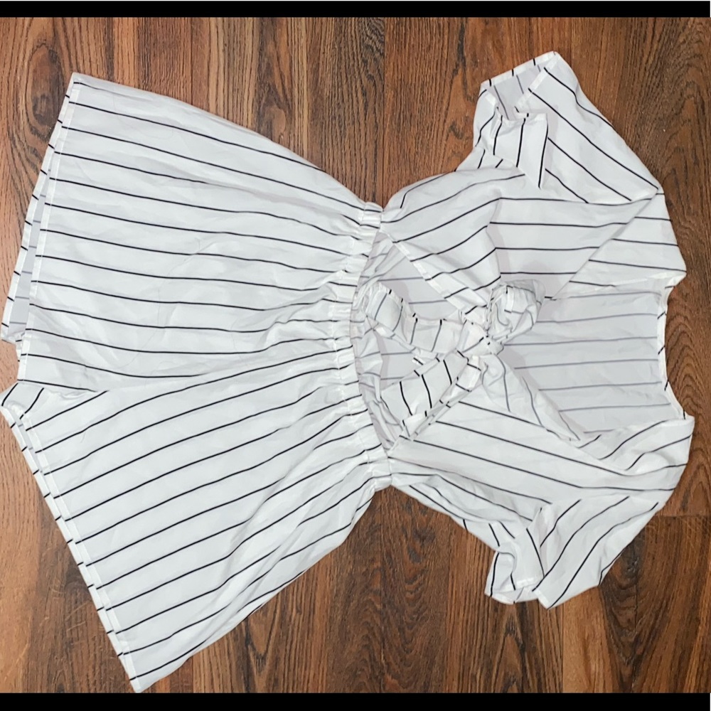 SOLD Peekaboo front tie romper